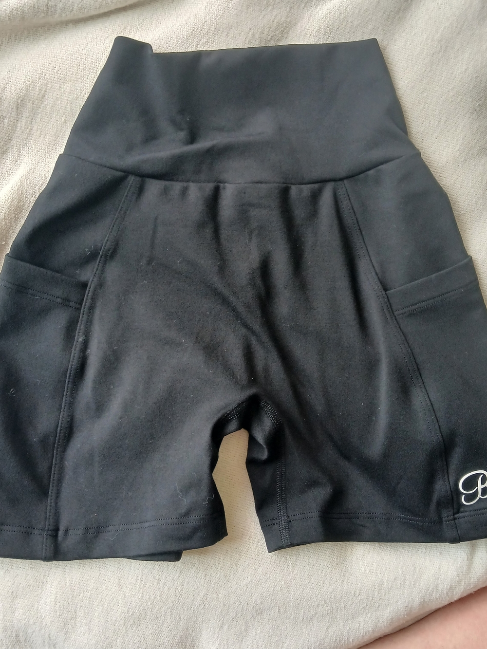 Bombshell Sportswear Black High-Rise Bike Shorts with Side Pockets